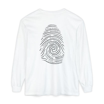 A white long-sleeve t-shirt with a graphic print of a spiral fingerprint on the back, set against a plain white background. Words like failure, making mistakes, perseverance and overcoming fill the spiral. 