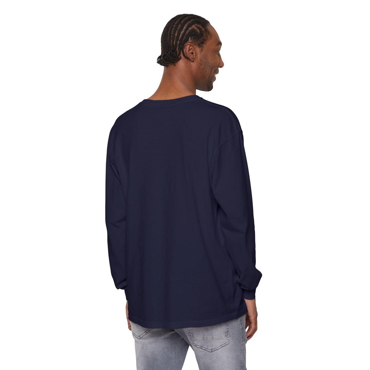 Person wearing a navy long-sleeve shirt on a white background