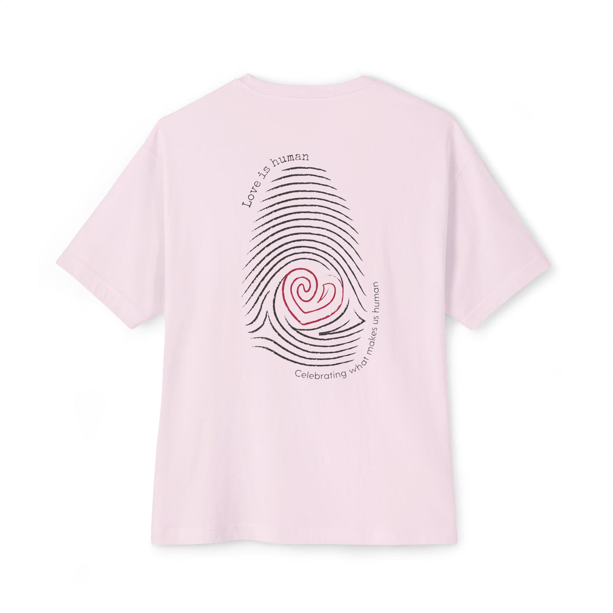 A light pink  short-sleeve t-shirt shown from the back, featuring a graphic print of a fingerprint with a red heart center and black text reading 'Love is human' and 'Celebrating what makes us human'.