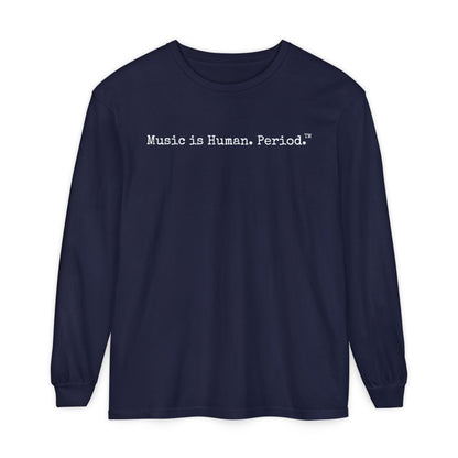 Navy long-sleeve shirt with text "Music is Human.Period" in clean type-writer font on white background.
