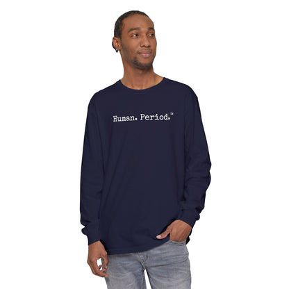 Man wearing navy long-sleeve crewneck t-shirt with the text 'Human.Period.' printed  across the chest, displayed on a clean white background.