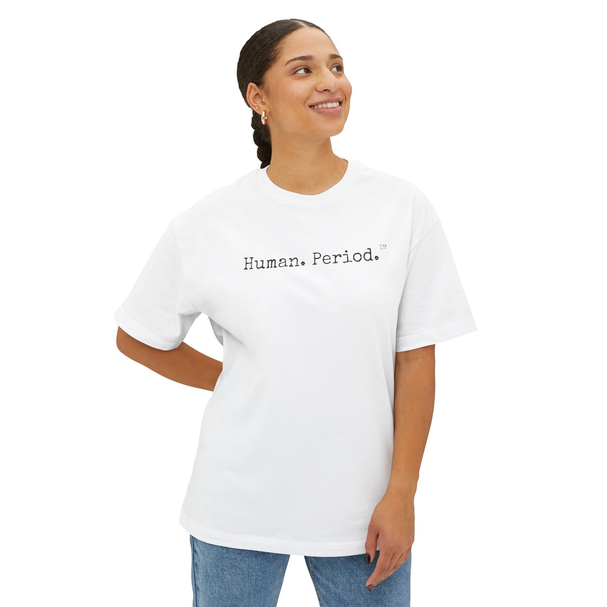 Woman wearing a white t-shirt with text on a plain background