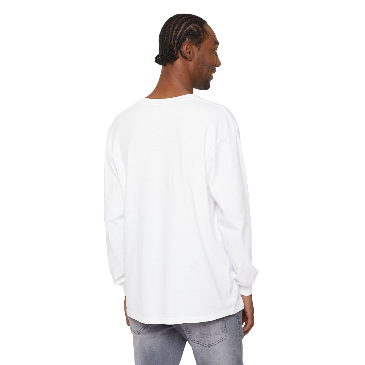 Person wearing a plain white long-sleeve shirt on a white background