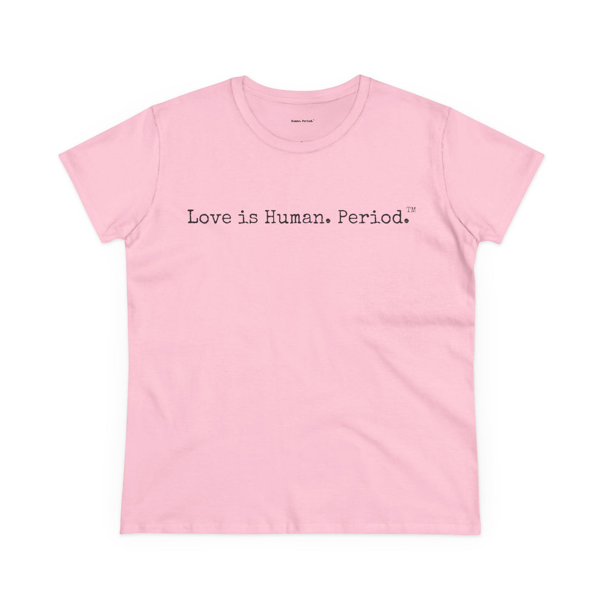A light pink short-sleeve crewneck t-shirt with the text 'Love is Human. Period.' printed in a black typewriter font across the chest, displayed on a clean white background.