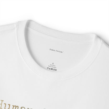 Close-up of a white crewneck t-shirt showing the inner neck label with 'Human Period.' printed inside, along with size 'L' and care instructions.