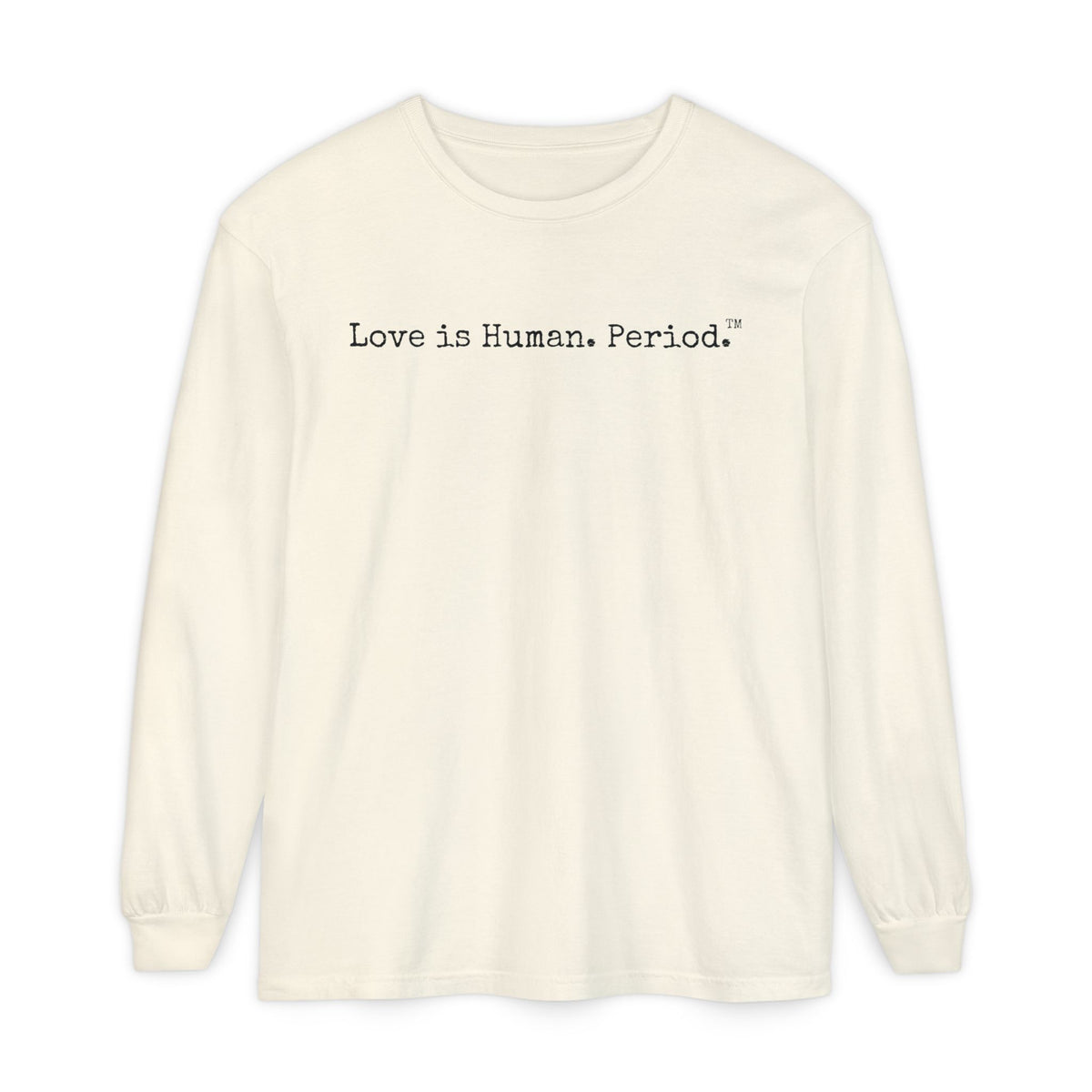 An off-white long-sleeve crewneck t-shirt with the text 'Love is Human. Period.' printed in black across the chest, displayed on a clean white background.