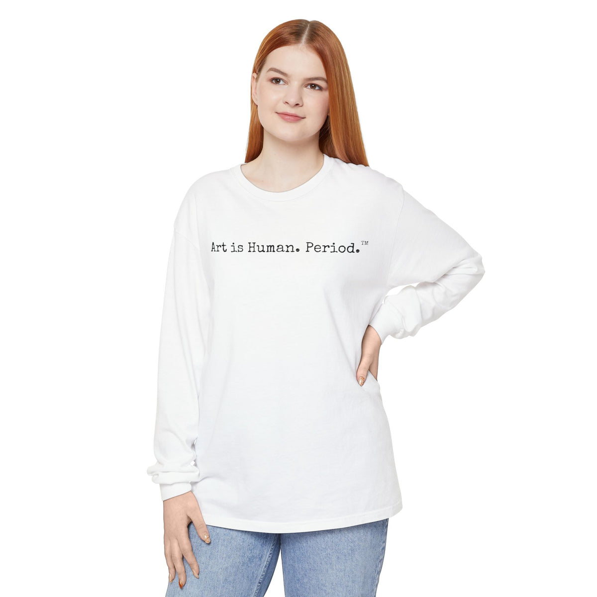 Woman wearing a white long-sleeve shirt on a white background, text is Art is Human. Period.