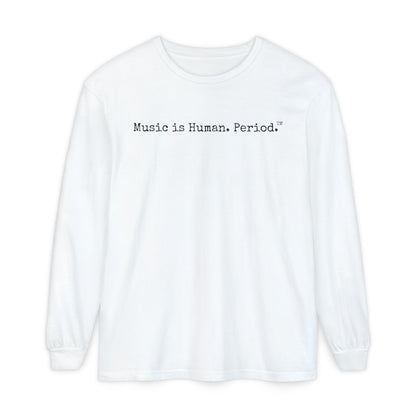 White long-sleeve shirt with text "Music is Human.Period" in clean type-writer font on white background.