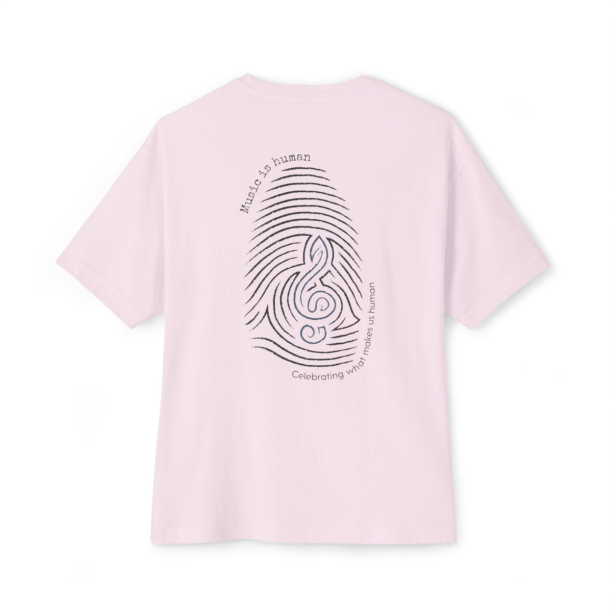 A light pink short-sleeve t-shirt shown from the back, featuring a black graphic of a fingerprint and musical notes with the text 'Music is human' and 'Celebrating music makes us human'.