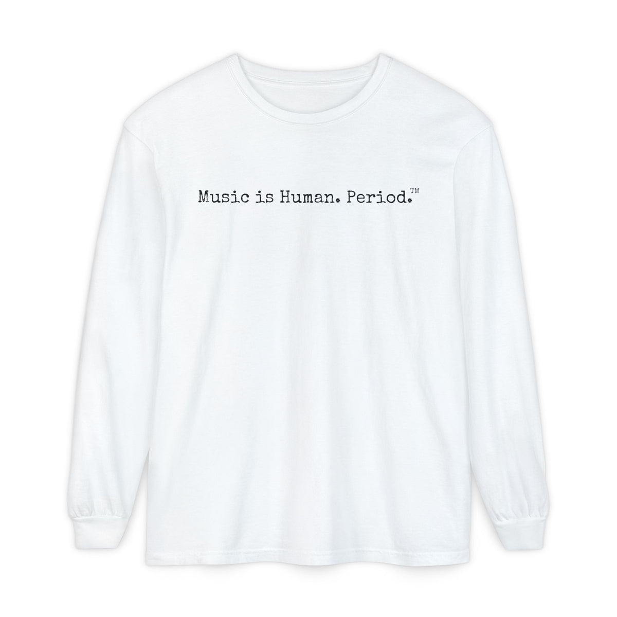 A white long-sleeve crewneck t-shirt with the text 'Music is Human. Period.' printed in black typewriter font across the chest, displayed on a clean white background.