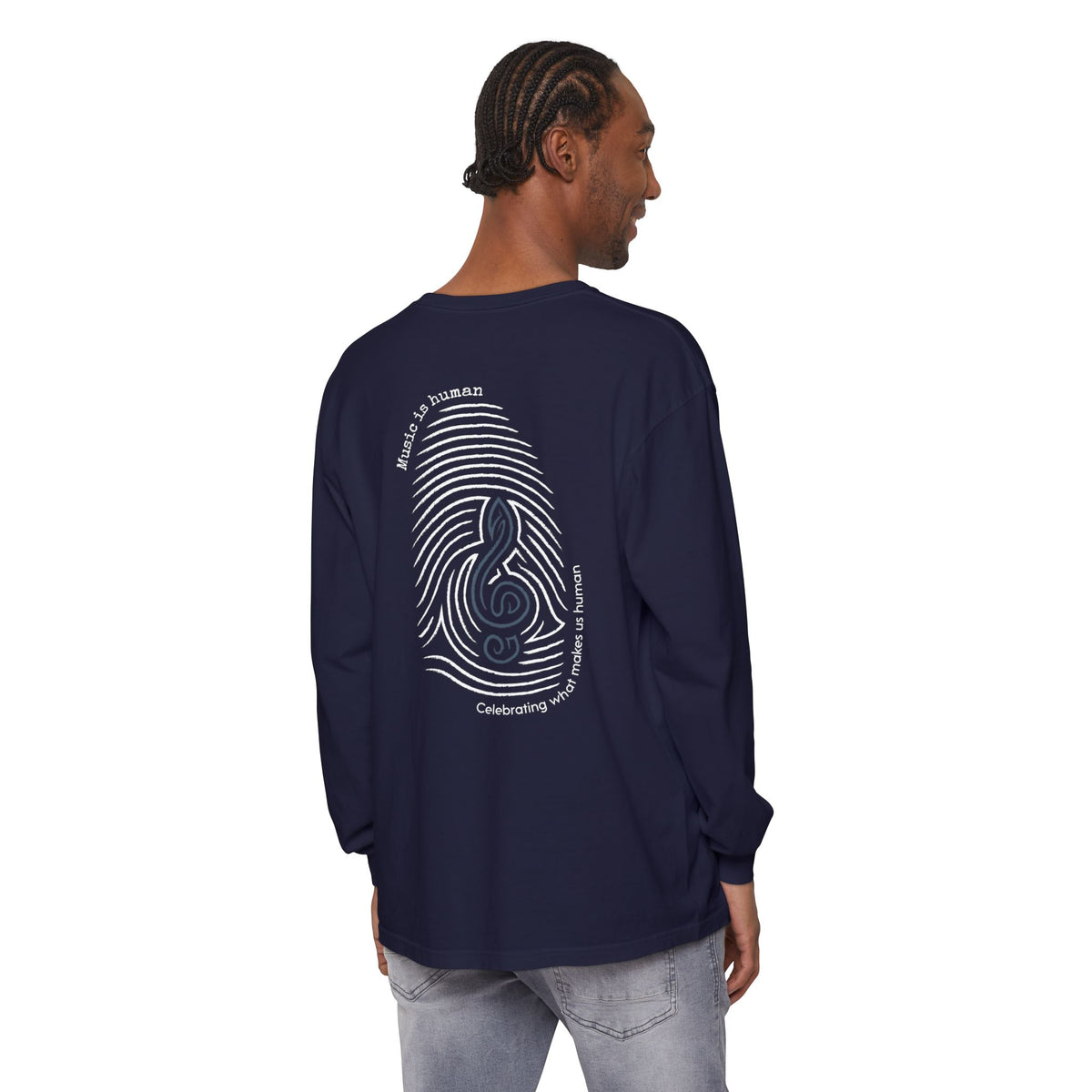 A man wearing a navy blue long-sleeve t-shirt with a white fingerprint and treble clef graphic on the back, shown from a rear three-quarter view against a white background.