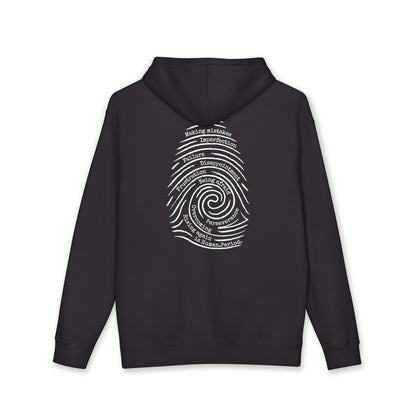 A black hoodie with a graphic print of a spiral fingerprint on the back, set against a plain white background. Words like failure, making mistakes, perseverance and overcoming fill the spiral. 