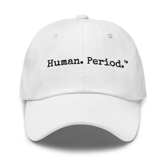 White cap with 'Human. Period. text on a white background